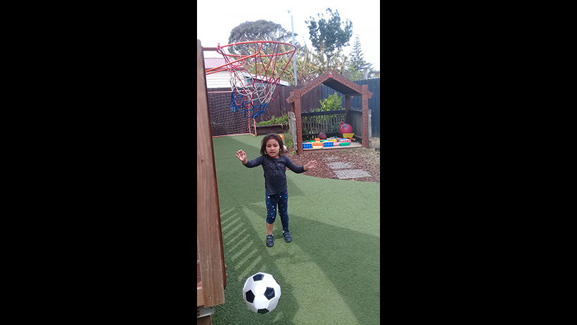 Children playing with balls at Learning Adventures Mangere East daycare